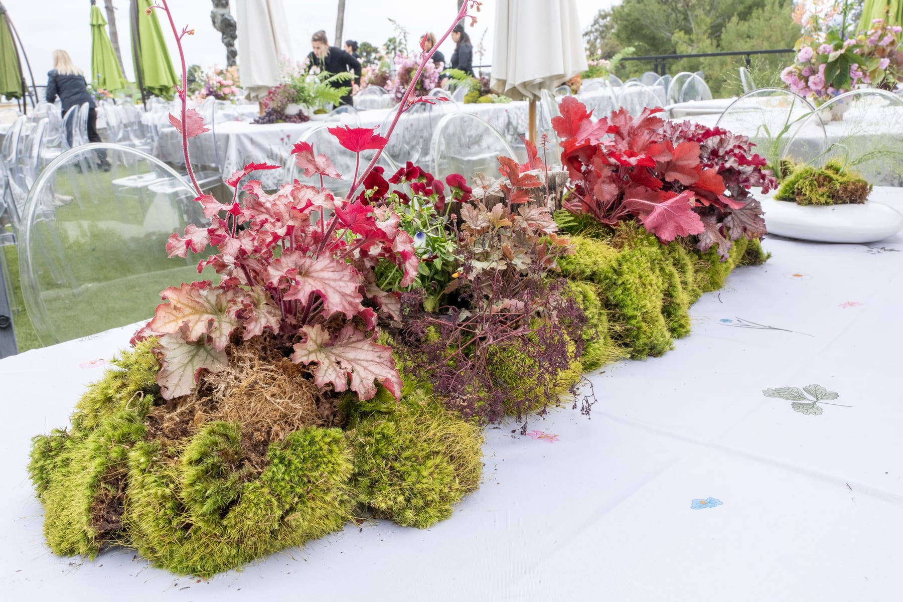 Moss and burgundy table installation, event 2025
