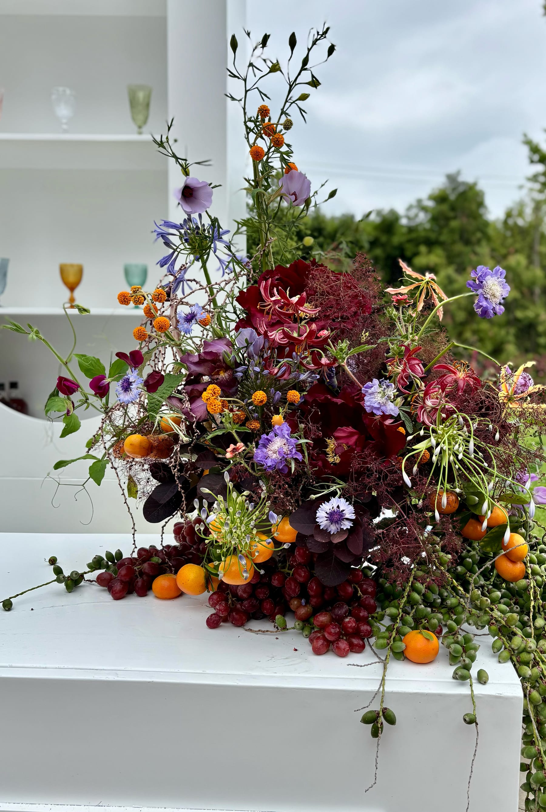 Floral fruit plinth installation